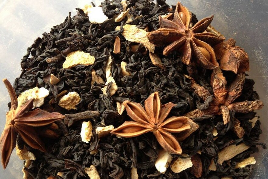 Loose-leaf tea with star anise and other spices.
