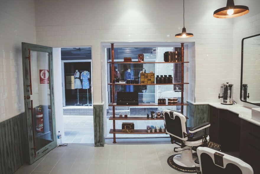 Interior of Alpha Barbers looking out towards the laneway. 