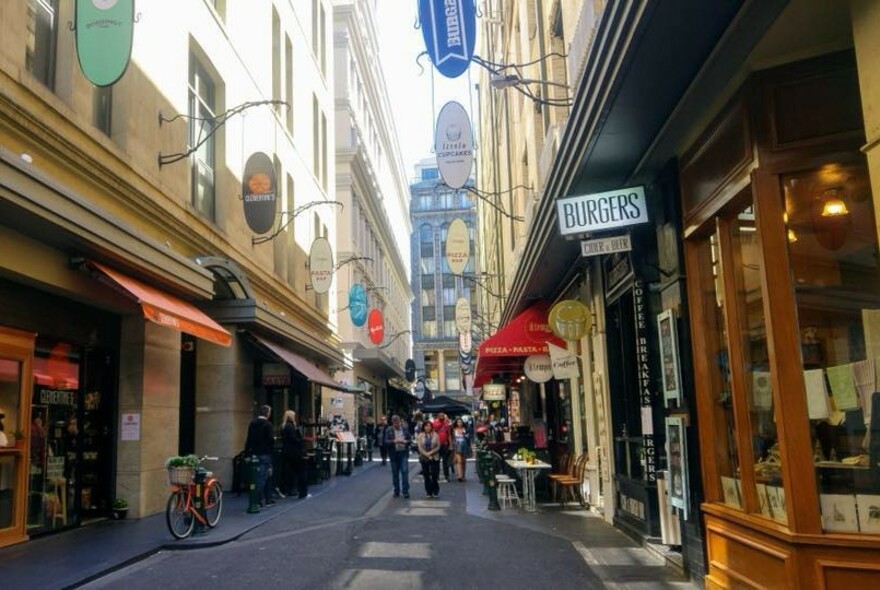Degraves Street view with Burgers sign and shopfront on the right.