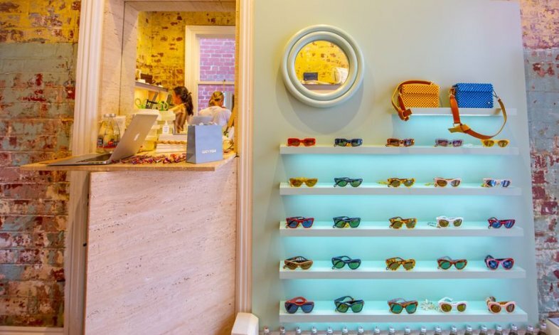 Wall of multicoloured sunglasses in a boutique