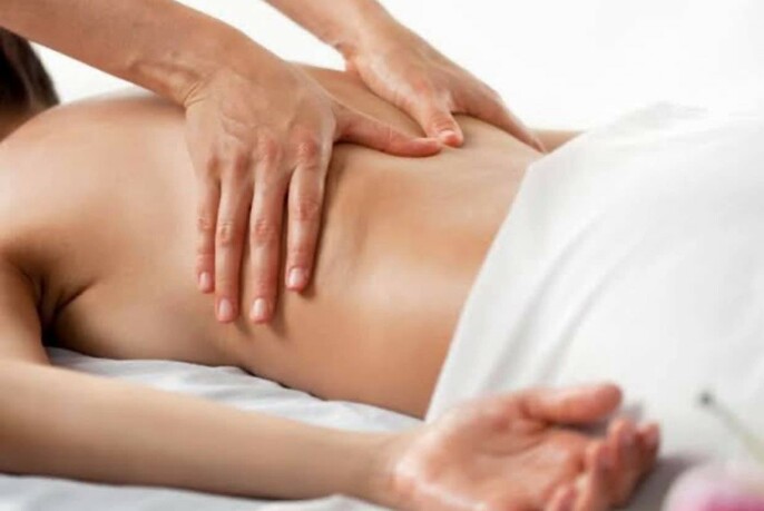 Woman receiving a massage.