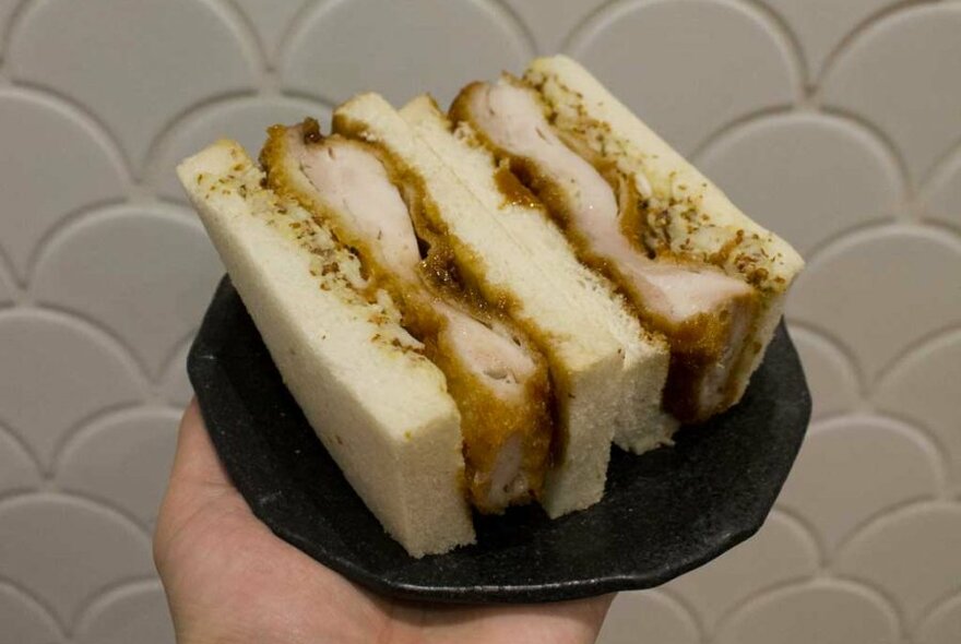 A chicken sandwich on white bread