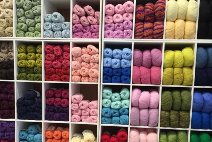 Balls of different coloured wool and yarns.
