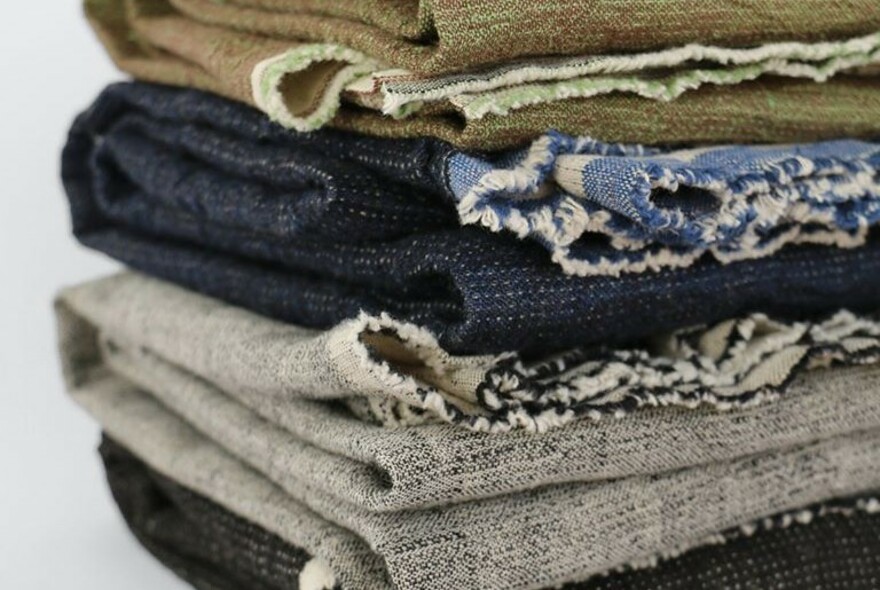 Stack of folded fabrics.