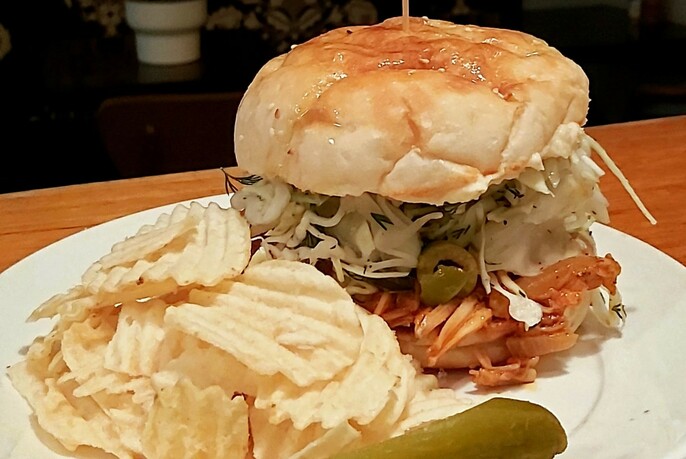 A burger and potato chips. 
