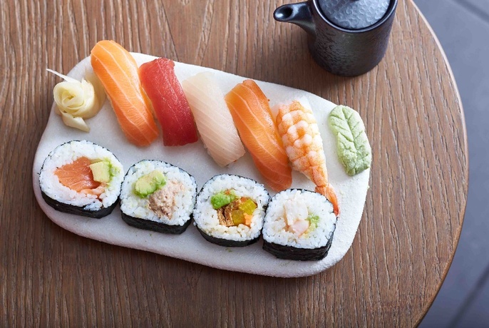A selection of sushi rolls and ngiri. 