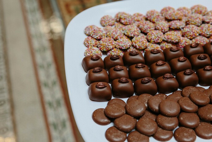 Plate of individual chocolates.