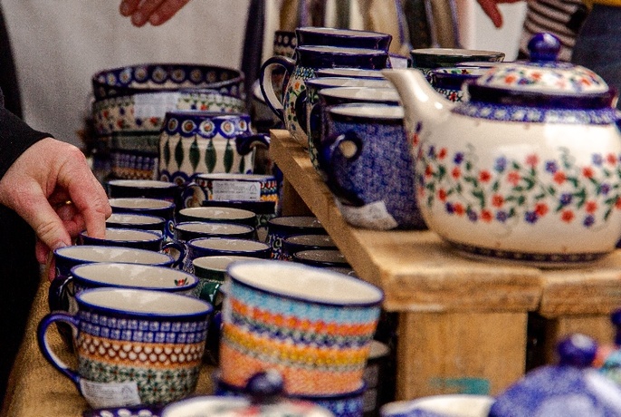 Close up of three rows of ceramics.