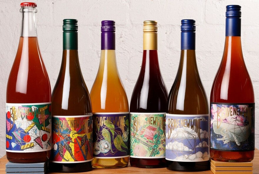 Wine bottles with colourful labels.