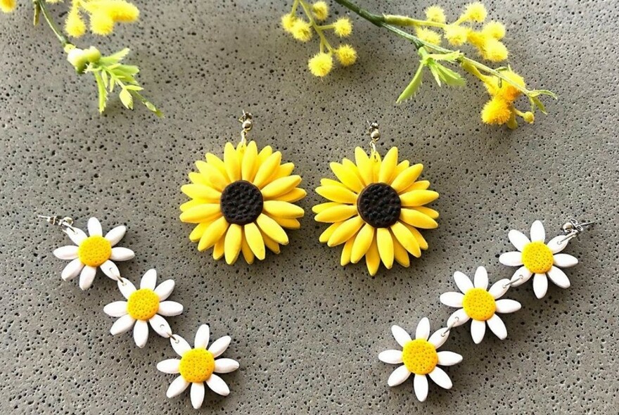 Brooches in daisy designs.