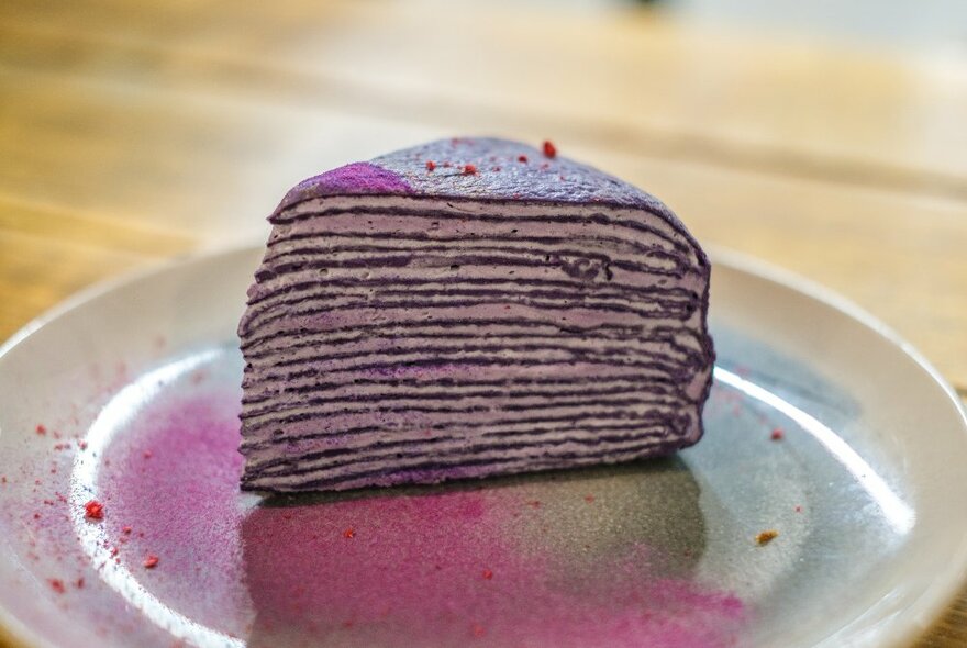 A purple layered crepe cake