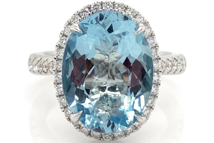Ring with large blue stone.