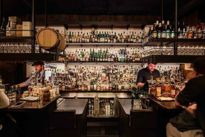 Bar with a large collection of whiskies.