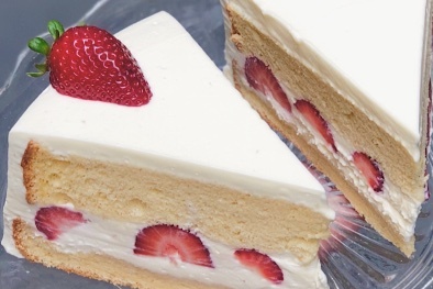 Slice of strawberry cream cake.