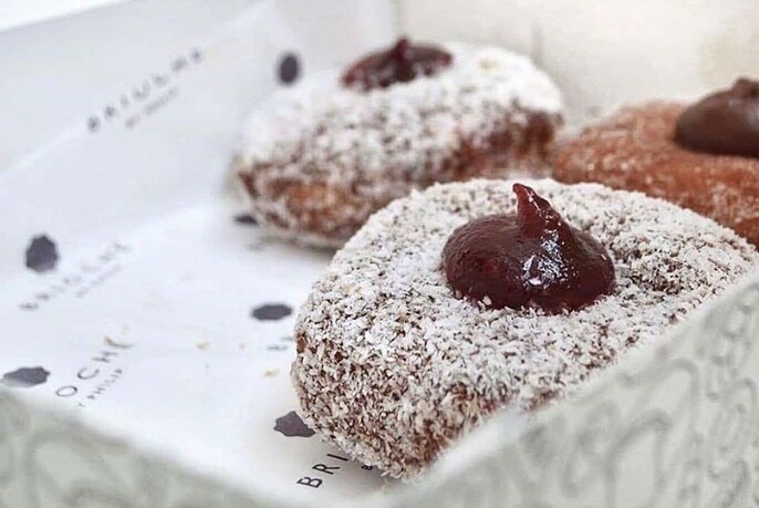 Doughnut with jam and coconut.