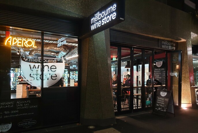 Night scene of the exterior of The Melbourne Wine Store
