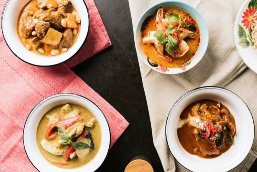 Selection of Thai curry dishes.