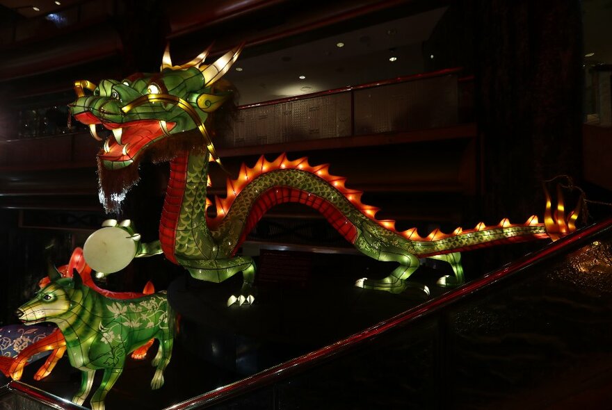 Large dragon installation on the staircase at Crown Atrium.