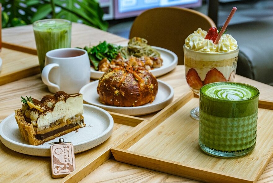 A selection of Japanese drinks, cakes and desserts in a cafe.