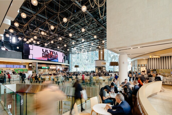Diners inside food court at Emporium Melbourne shopping centre.