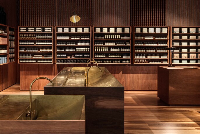 Interior of Aesop Emporium showing shelves of products