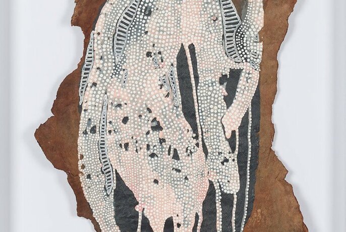 Indigenous dot painting artwork on bark.