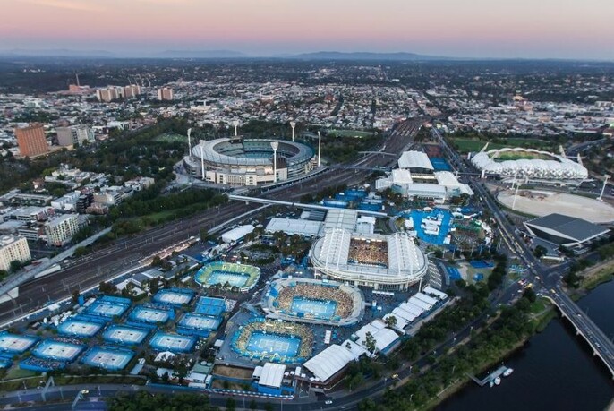 Aerial view of Melbourne and Olympic Parks including tennis courts and arenas.