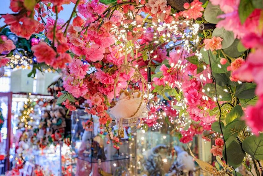 Artificial blossom decorations in Ambiance Christmas store.