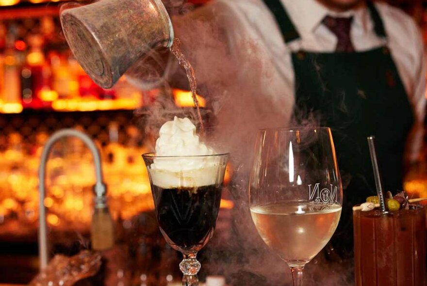 Bartender creating a nitro cocktail