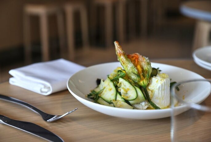 Salad with slices of cucumber.