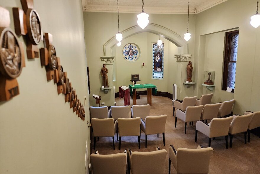 Small chapel with a few chairs inside the Mary MacKillop Heritage Centre.