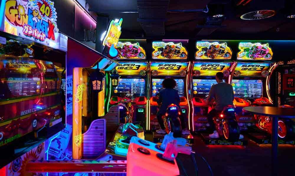 People playing arcade games