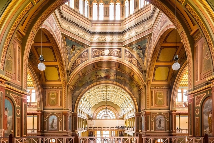 Interior of gold and coloured dome.