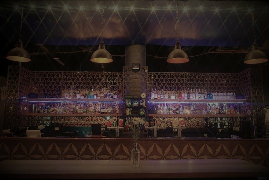 Dark interior of The Tessie Pearl's bar.