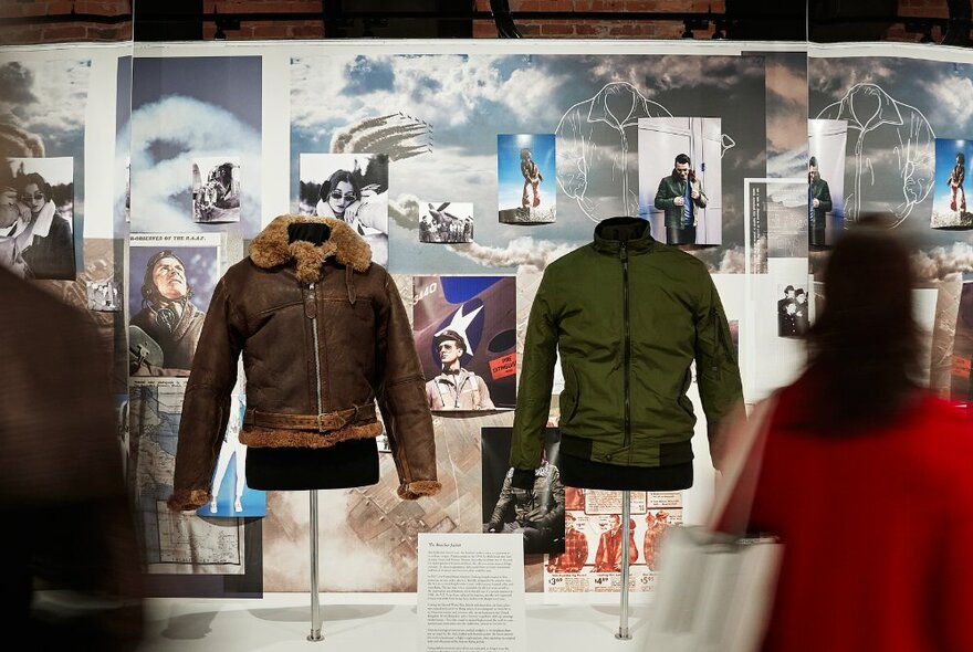 A military jacket and its fashionable countepart on display.
