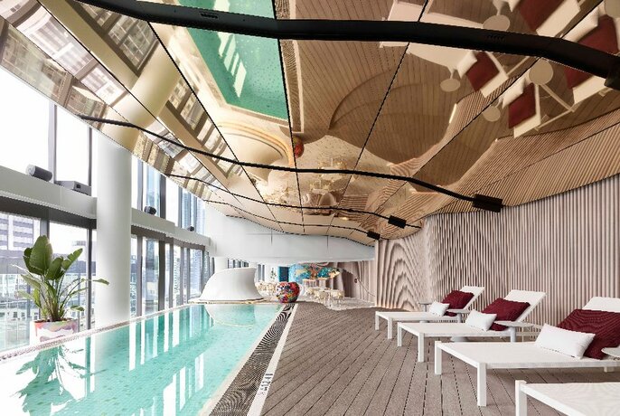 An indoor pool area in an upmarket hotel.