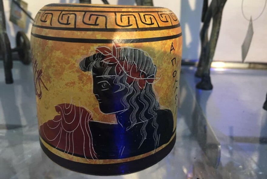 Modern ceramic pot with ancient Greek-style motif.