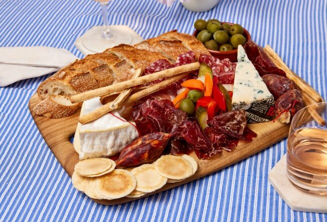 An antipasti platter with meat and cheese. 