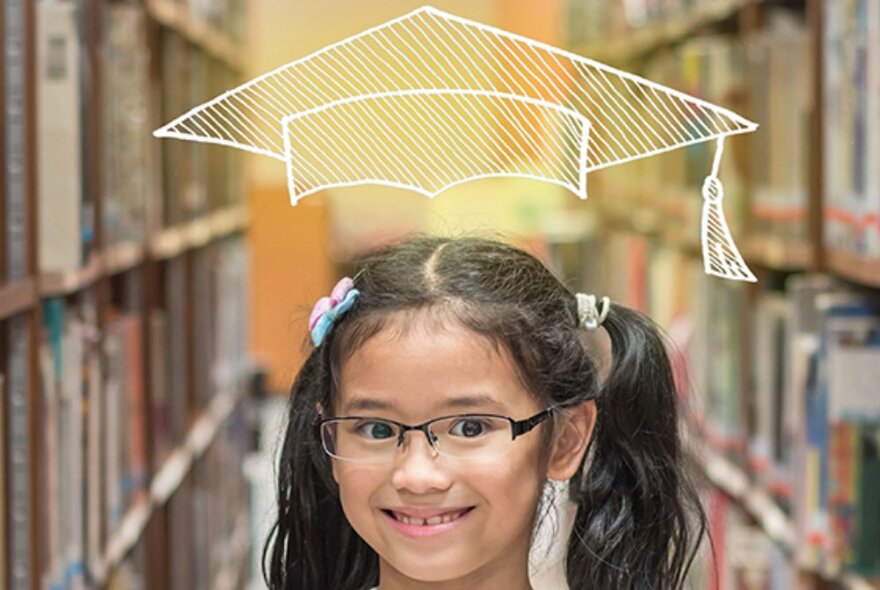 A child standing in a row of library books, a scholar's mortarboard drawn above her head.