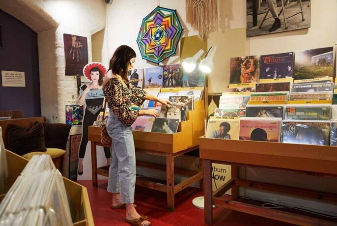 Person browsing record selection.