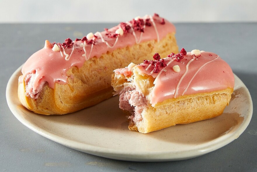 Eclairs with pink icing.