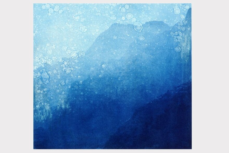 An etching of shapes that appear like mountains, mostly blue. 