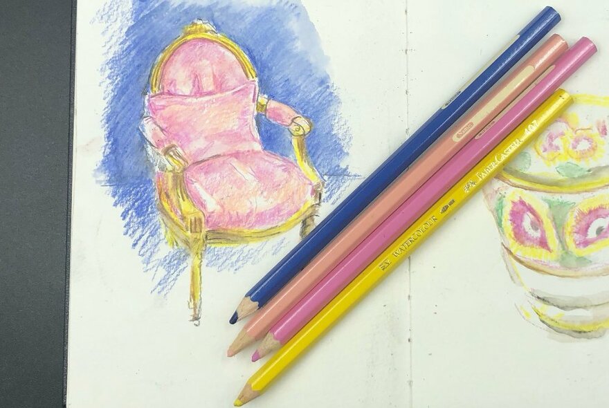 A sketch of an Regency style armchair with coloured pencils resting on the white paper.