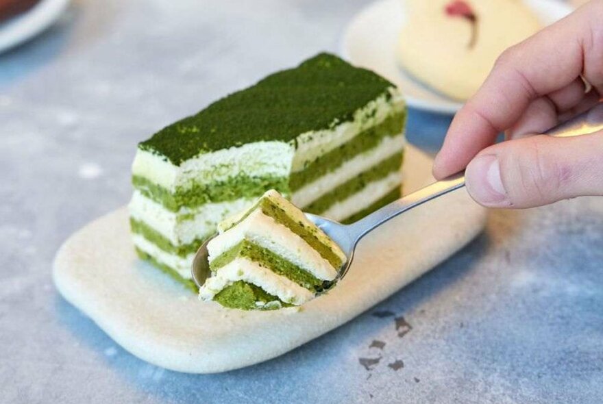 A white and green layer cake.