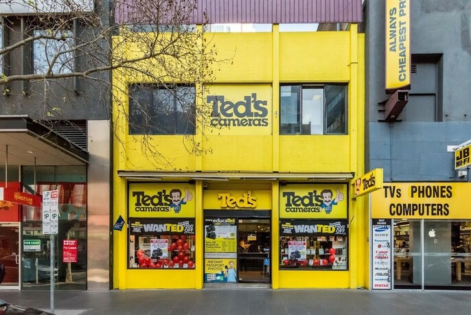 Bright yellow two-storey Ted's Camera store in Elizabeth Street.