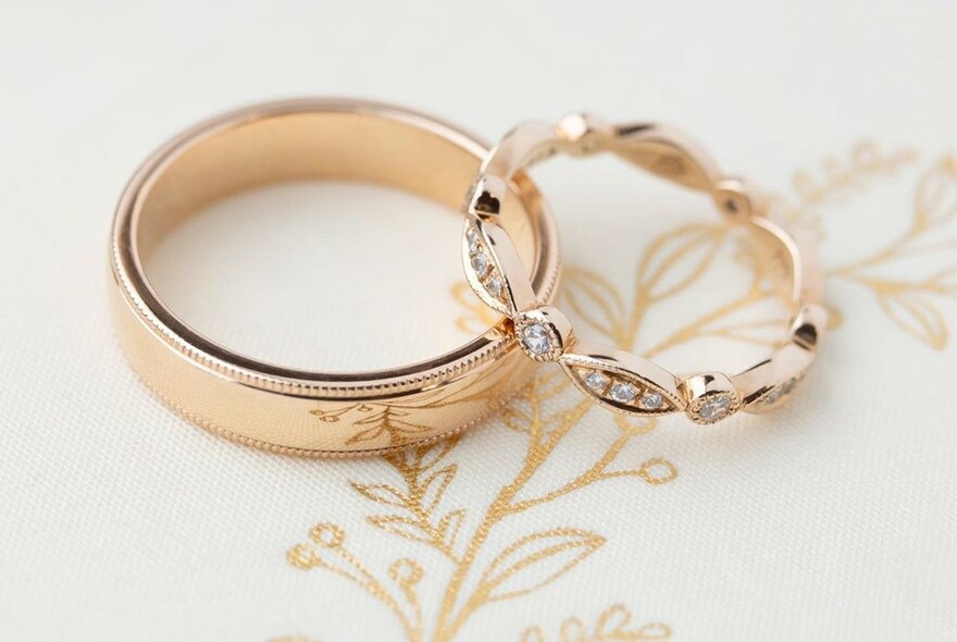 Diamond and rose gold rings.
