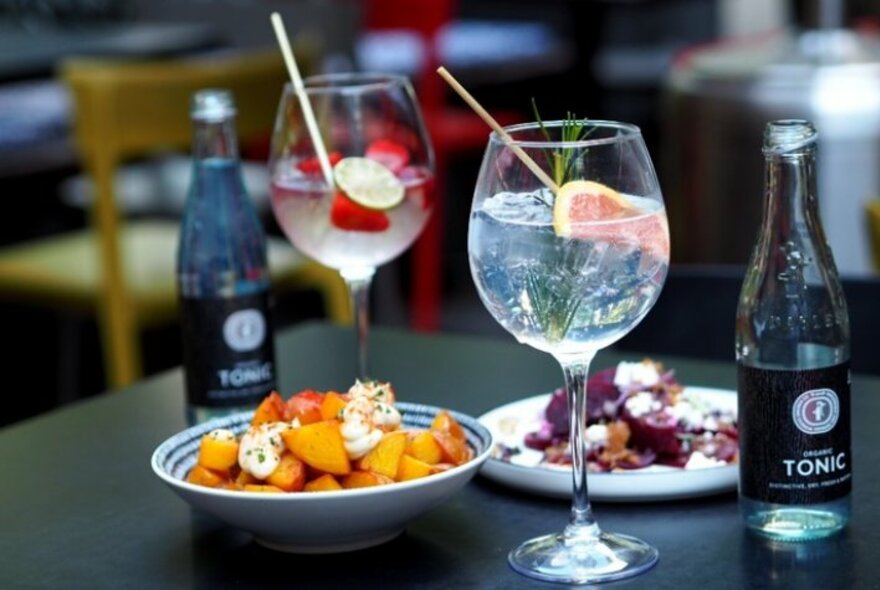 Gin and tonic with tapas.
