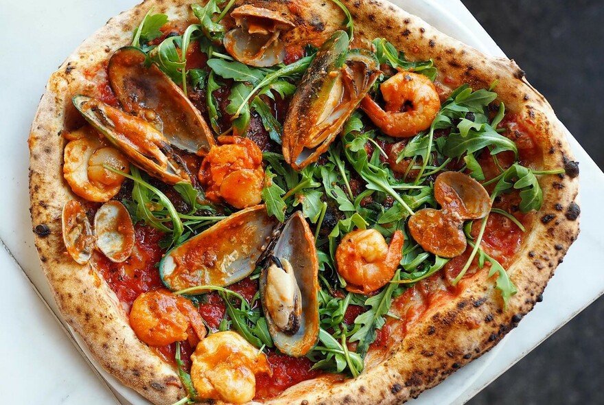 Pizza marinara with prawns and mussels.
