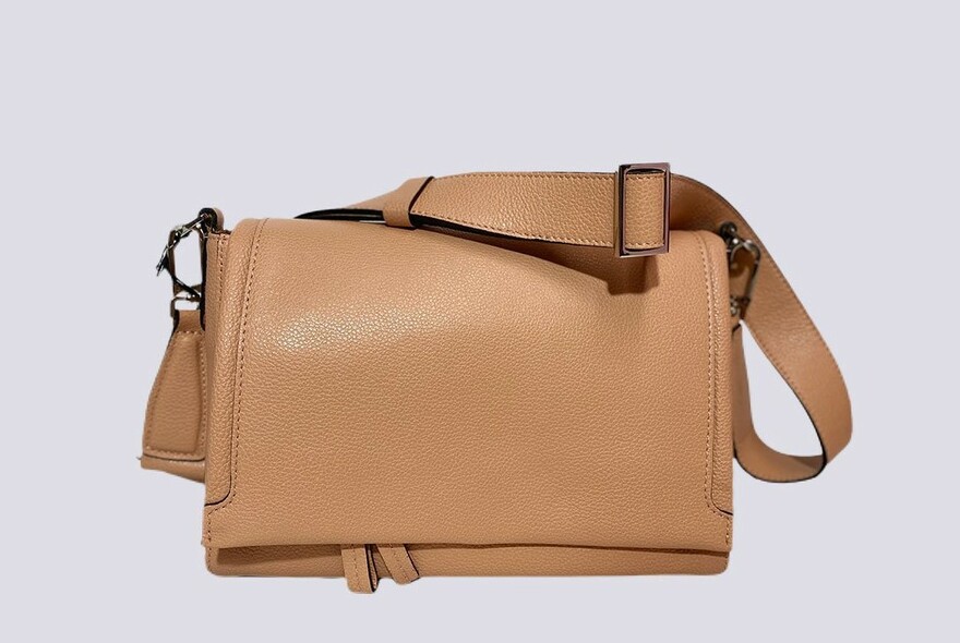 Beige leather handbag.