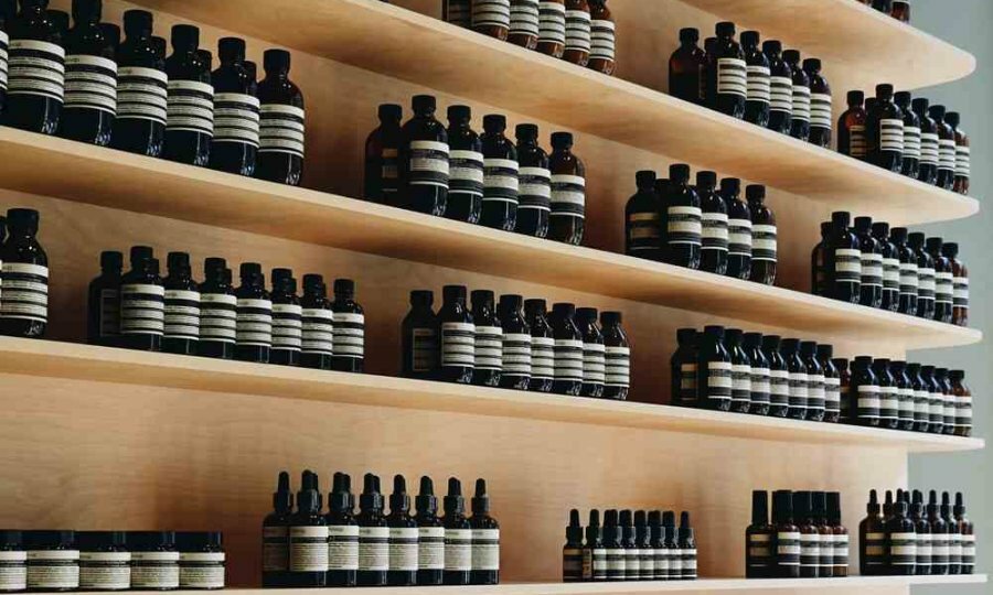 Rows of brown bottles on shelves at a beauty shop